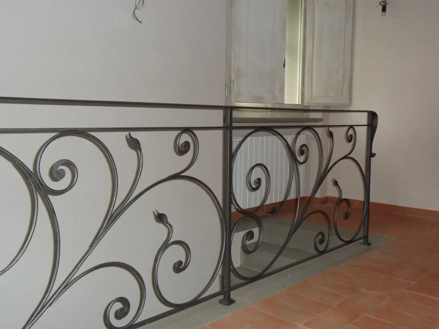 Scala o ringhiera in ferro battuto (foto 34)